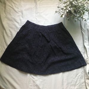 Navy lace mini skirt
